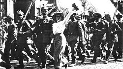 Civilians join German soldiers on their first mile's march towards Paris